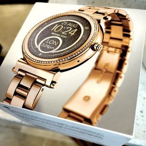 Michael Kors Smartwatch in Gold. New Mkt5021. Comes with box, tag and manuals